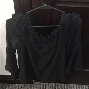Black ruffled off the shoulder shirt